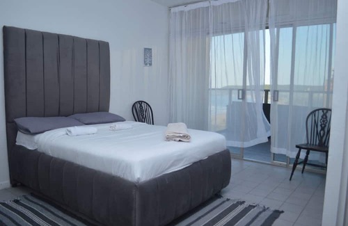 South Beach Apartment | Scenic Ocean View Apartment with Pool & Family Amenities