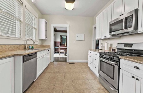 Downtown Riverside House | Pet-Friendly Retreat with Dedicated Workspace & Fenced Yard