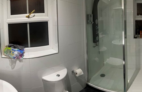 Foxdale House | Relaxing Hot Tub Retreat by the Waterfall Awaits You