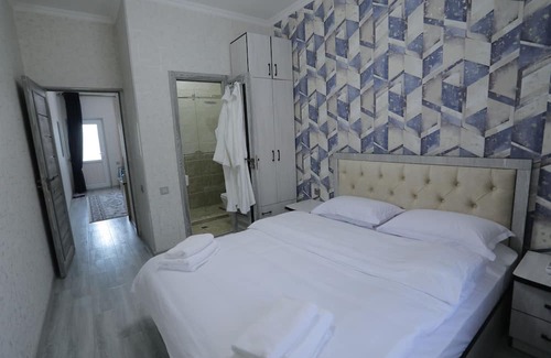 Uzbekistan Hotel | Discover Anka Palace: Poolside Relaxation Awaits You