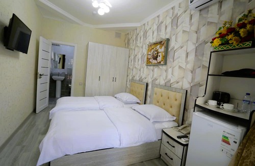 Uzbekistan Hotel | Discover Anka Palace: Poolside Relaxation Awaits You