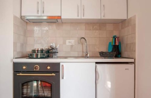 Lastva Grbaljska Apartment | Cozy Villa D Apartments: Family and Pet Friendly Retreat