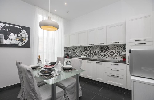 Castelletto Apartment | Stylish B&W Two-Room Apartment with Balcony & Kitchen
