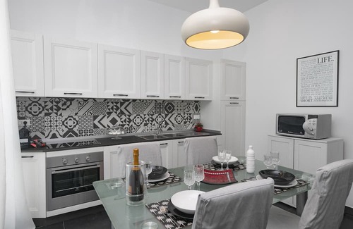 Castelletto Apartment | Stylish B&W Two-Room Apartment with Balcony & Kitchen