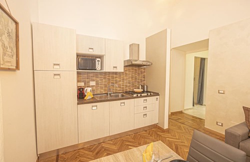 Maddalena Apartment | Gold Apartment: Elegant Three-Room Retreat with Kitchen