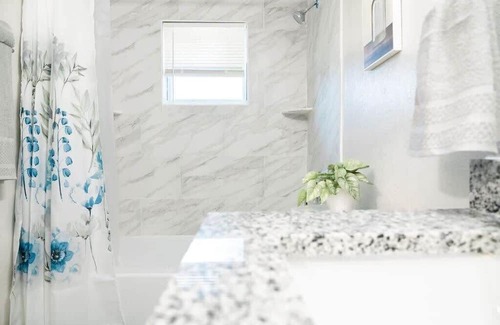 University Apartment | Tranquil University Serenity Suites with Lake View & Kitchen