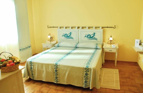 La Maddalena Hotel | Relax in a Poolside Retreat at La Maddalena Hotel
