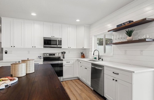 Clearwater House | Experience Sea Breeze Haven with Heated Pool & Fire Pit