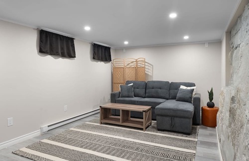 Dieppe House | Modern Retreat with King Bed, Steps from Dining & Starbucks