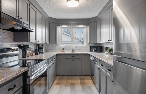 Dieppe House | Modern Retreat with King Bed, Steps from Dining & Starbucks