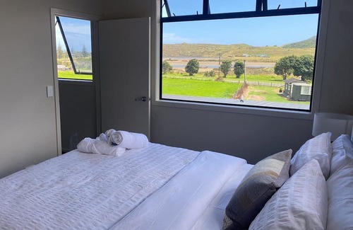 Waitomo District House | Discover Mee ‘N G’s Boat Shed: Marokopa's Premier Stay!