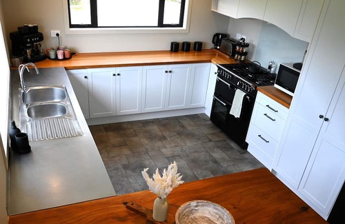 Waitomo District House | Discover Mee ‘N G’s Boat Shed: Marokopa's Premier Stay!