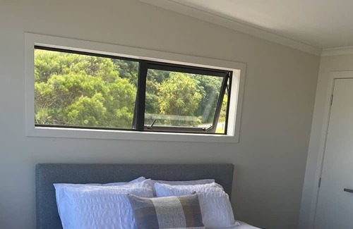 Waitomo District House | Discover Mee ‘N G’s Boat Shed: Marokopa's Premier Stay!