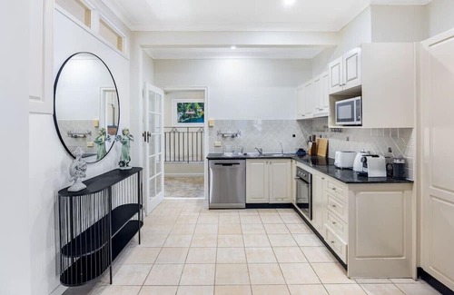 South Brisbane Apartment | Charming European Château with Riverside View & Family-Friendly Amenities