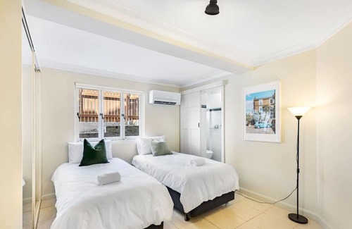 South Brisbane Apartment | Charming European Château with Riverside View & Family-Friendly Amenities