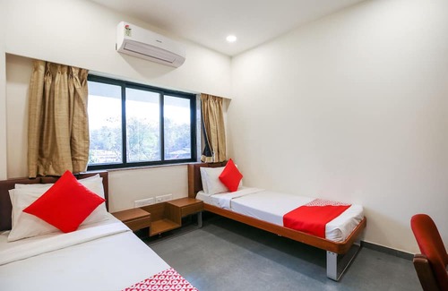 Khanvel Hotel | OYO Flagship Hotel Green-acre