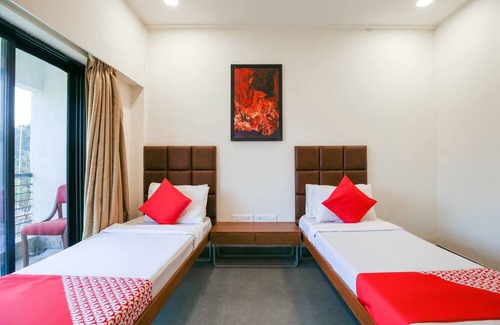 Khanvel Hotel | OYO Flagship Hotel Green-acre