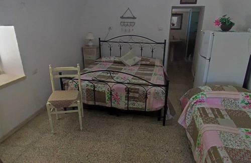 Posto Vecchio Apartment | Tranquil Apartment 'Trullo' with Private Garden & Ocean View