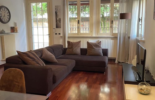 Ferrara Apartment | Elegant Flat Near Ferrara's Center with Private Garden