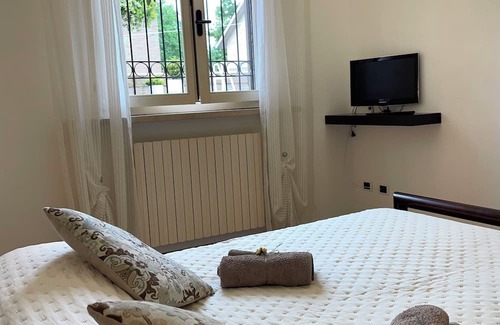 Ferrara Apartment | Elegant Flat Near Ferrara's Center with Private Garden
