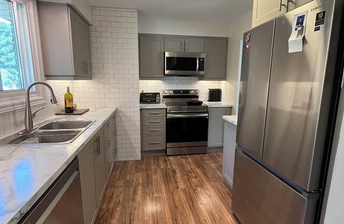 Barrie Apartment | Inviting King Bedroom Suite with Kitchen in North Barrie