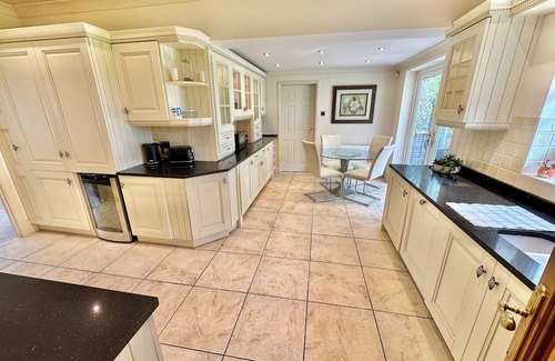 Ferndown House | Golf Course View: Family-friendly Four Bed Retreat with Garden