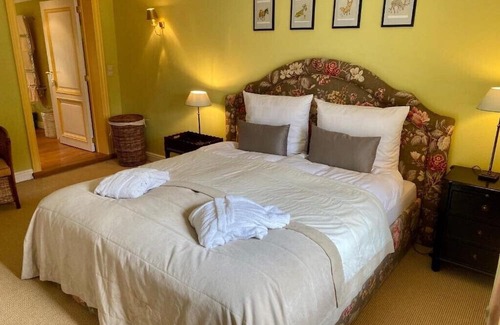Hockai House | Cozy Cottage Near Scenic Hiking Trails and Racetrack Fun