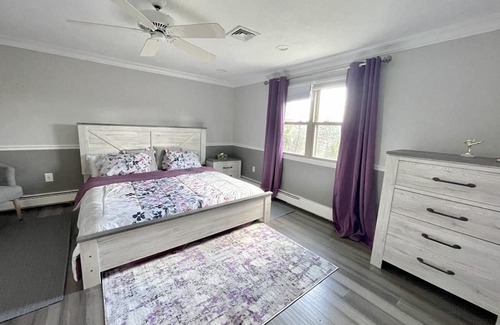 Cranston House | Tranquil 3-Floor Retreat with Spa Near Malls and Airport