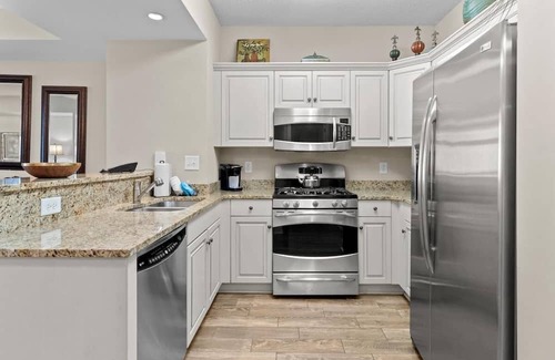 Windy Hill House | Beachfront Aqua Escape: Family-Friendly 2BR Condo Retreat
