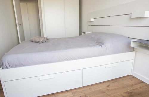 L'Ile-Saint-Denis Apartment | Inviting Apartment with Eiffel Tower Views and Family Amenities