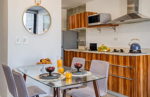 Avenida Revolucion Apartment | Stylish Apartment with Private Balcony & Access to Gym