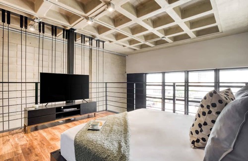 Avenida Revolucion Apartment | Trendy Duplex Loft with Rooftop in Prime Location