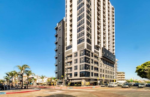 Avenida Revolucion Apartment | Inviting Apartment with Balcony, Pool & Fitness Amenities
