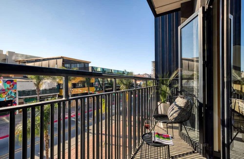 Avenida Revolucion Apartment | Inviting Apartment with Balcony, Pool & Fitness Amenities