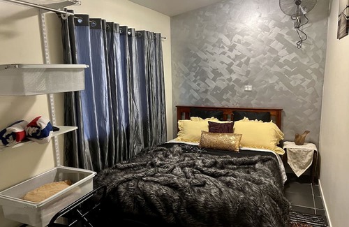 Malanda Cabin | Cozy Figtree Getaway: 3-Bedroom Cabin with Spa & Fireplace