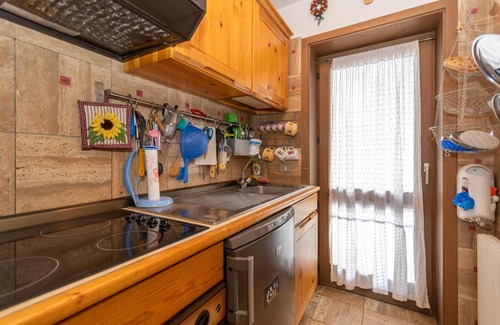 Alba Apartment | Discover Casa Lucilla: Family-Friendly with Great Amenities