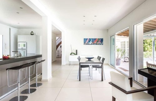 Saint-Clement-de-Riviere Villa | Villa des Rosiers: Serene Garden Oasis with Inviting Pool