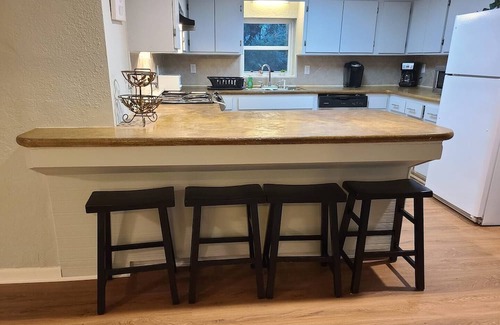 Lower Grand Lagoon House | Cozy Beach Bungalow - Pet-Friendly, Steps from the Shore