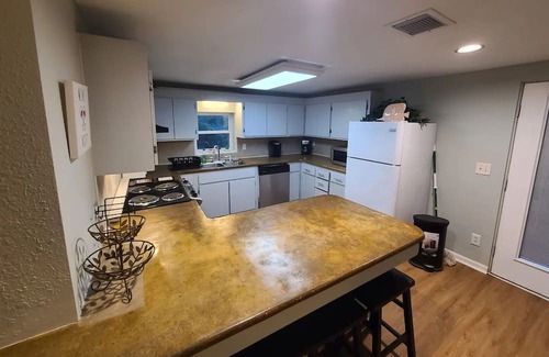 Lower Grand Lagoon House | Cozy Beach Bungalow - Pet-Friendly, Steps from the Shore