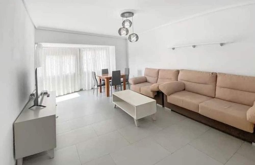 Castello de la Plana Apartment | Elegant 4-Bed Retreat Near Train Station for Families