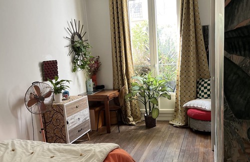 19th Arrondissement Apartment | Discover Parc des Buttes Chaumont: Family-Friendly Retreat