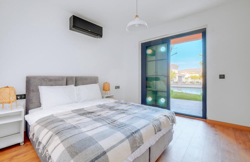 Alacati Apartment | Enjoy a Balcony Retreat with Shared Pool in Alacati