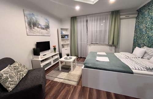 Miskolc Apartment | Contemporary Downtown Apartment with Balcony for Up to 3