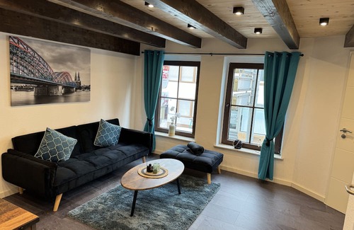 Siegburg Apartment | Elegant 4711 Suite: Unique, Central Stay for Families