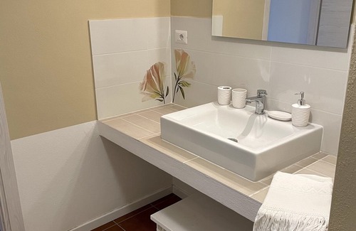 Lanusei Apartment | Escape to Casa Mirto: Garden View Apartment with Kitchen