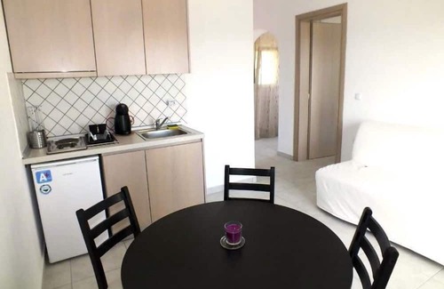 Astris Apartment | Seaview Garden Oasis - Family-Friendly & Breakfast Included
