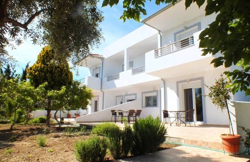 Astris Apartment | Seaview Garden Oasis - Family-Friendly & Breakfast Included