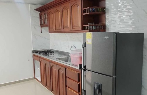 Gaira Apartment | Cozy Apartment Near Sports Venues with Kitchen Access