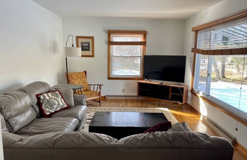 Alden House | Comfortable Stay Near Torch Lake for Family Getaways