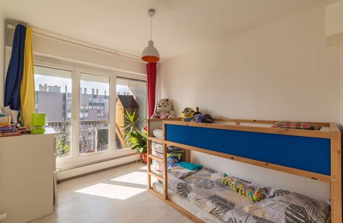 Flandres Apartment | Inviting Skyscraper with Two Terraces and Family Amenities